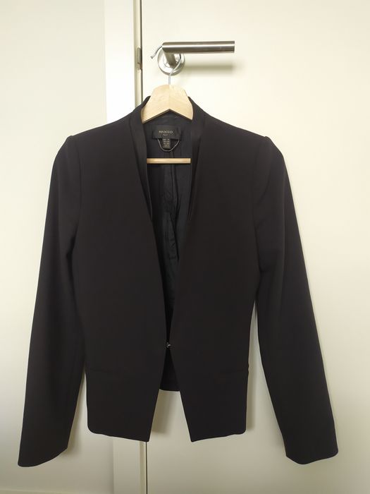 Чорний піджак на дівчинку