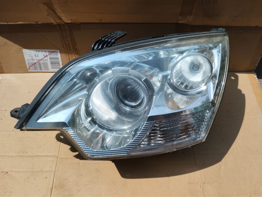 Lampa przednia lewa opel Antara xenon