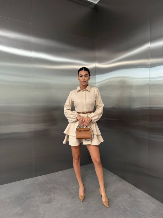 Жіноча сукня з воланами