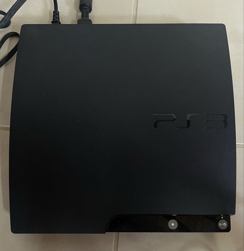 Ps3 Slim + 2 comandos + jogos