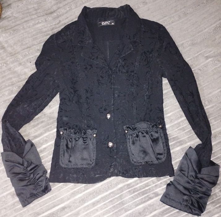 Дизайнерськв блузка стильна