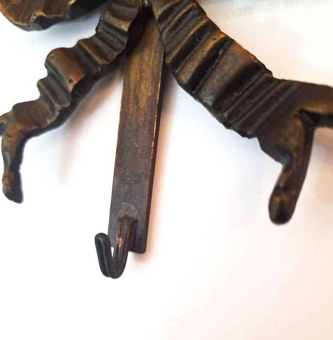 Suporte de parede para prato em bronze