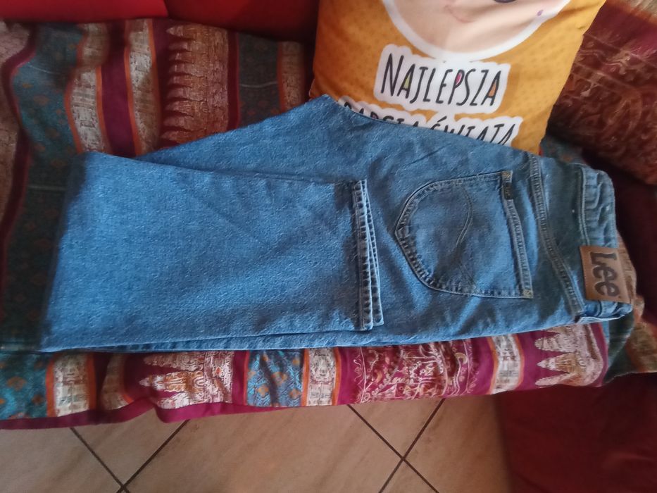Spodnie damskie marki Lee jak nowe.