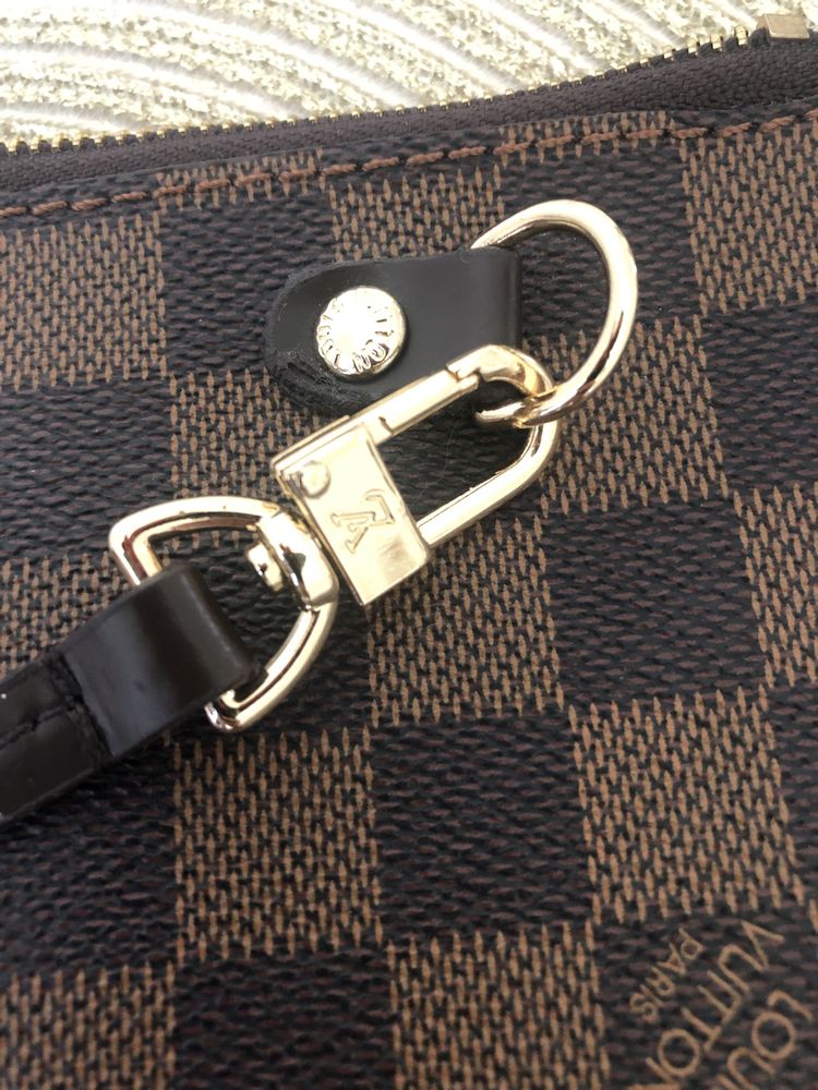 Saszetka Louis Vuitton