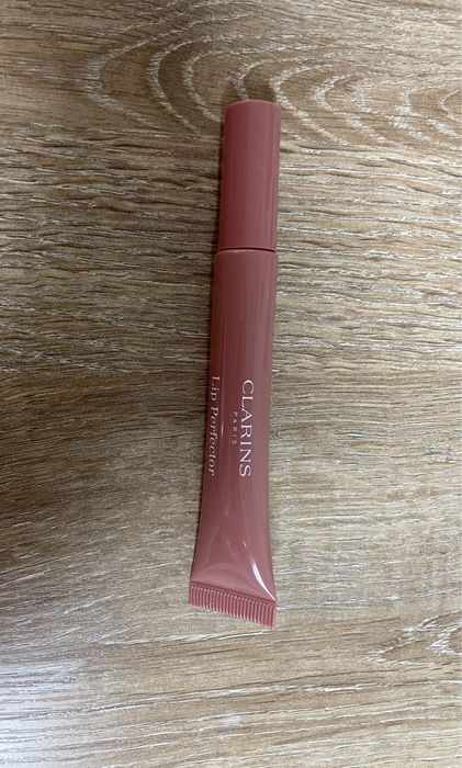 Блеск для губ Clarins Natural Lip Perfector 06 оригинал новый