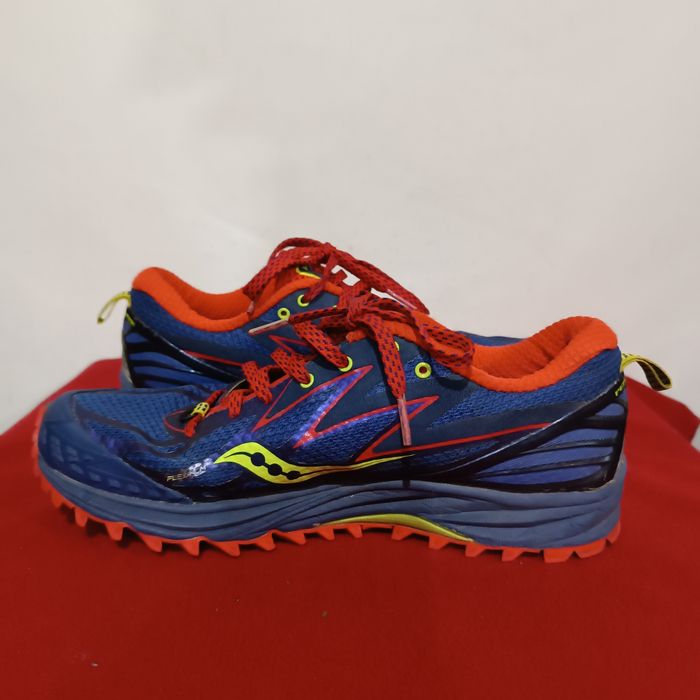 Buty Saucony sportowe do biegania treningowe roz,39,
2. Spodnie McKinl