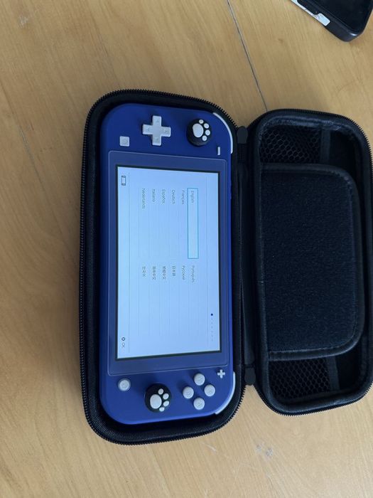 Nintendo switch lite + etui + szybka ochronna + ładowarka