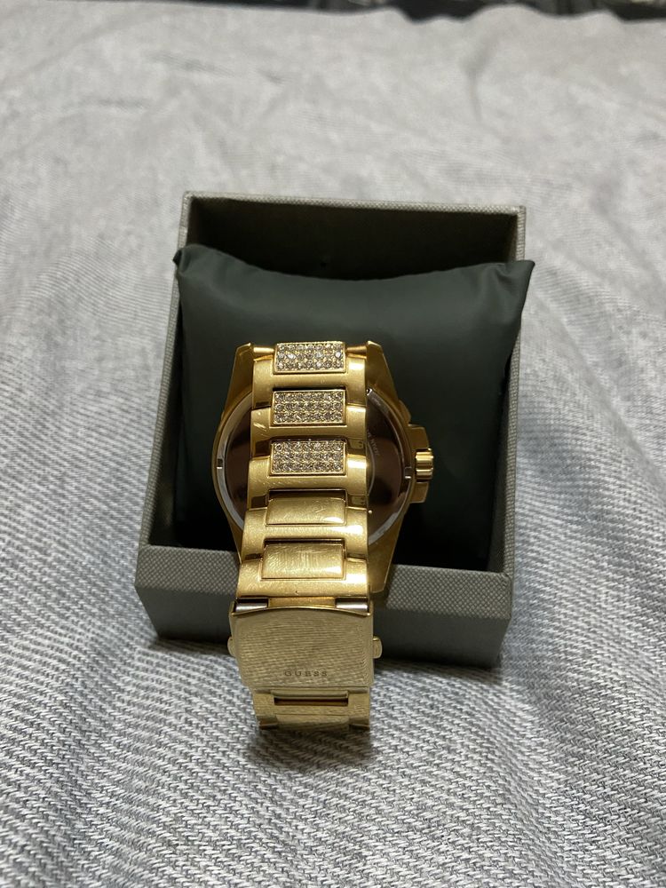 Relogio guess dourado