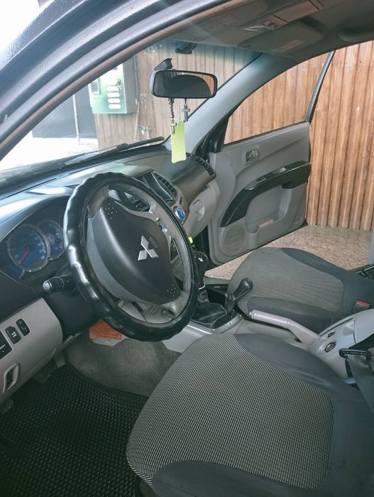 Mitsubishi L200 Авто