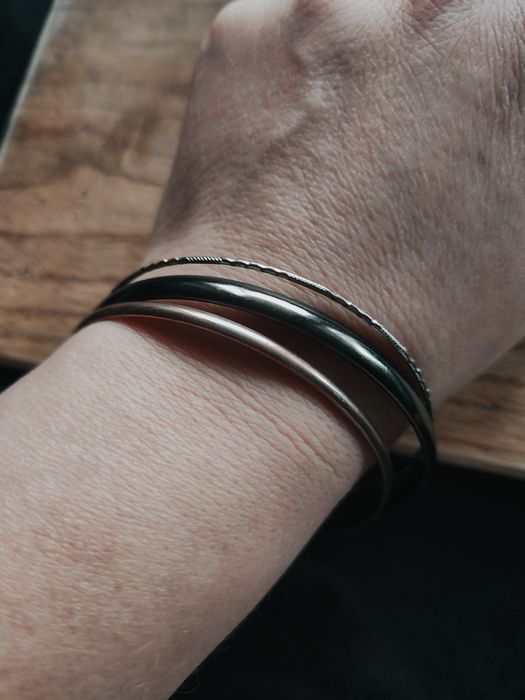 Komplet trzech metalowych bransoletek koła