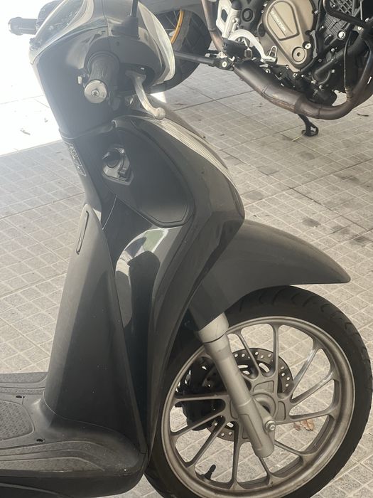 Mota em bom estado . Hoda 125 sh