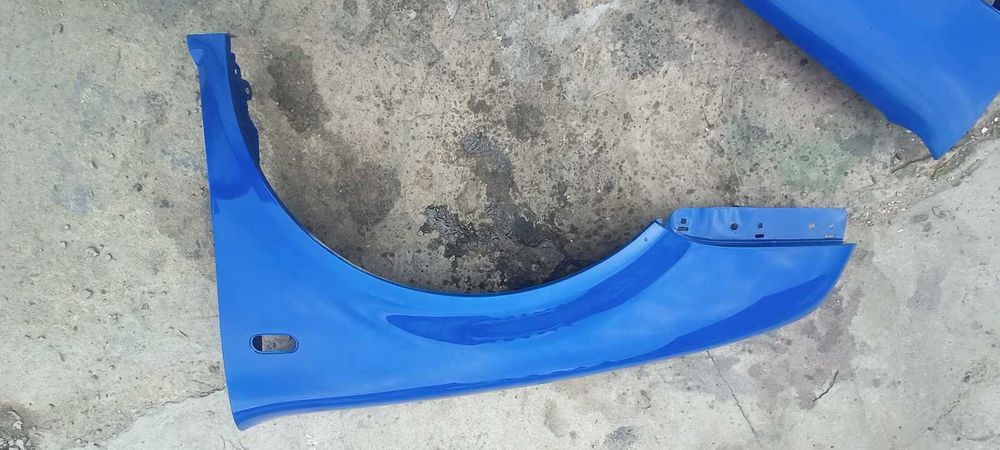 Błotnik Golf 4 LW5Z