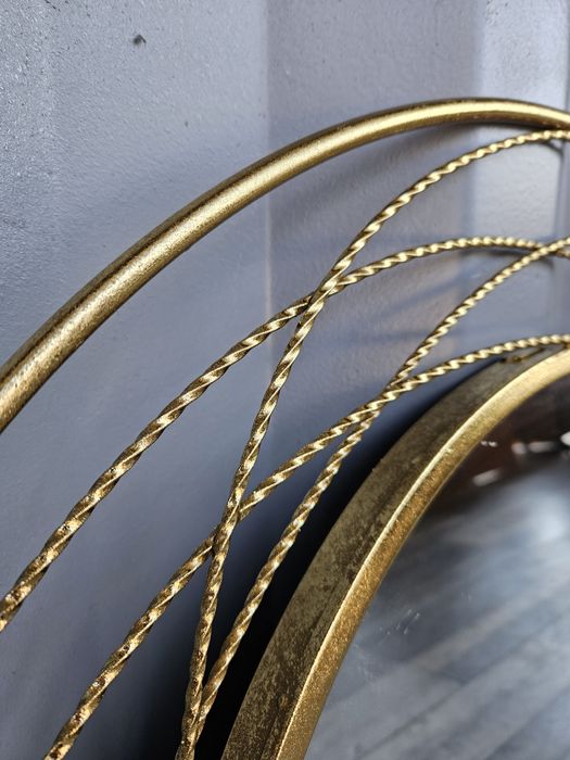 Złote lustro okrągła rama