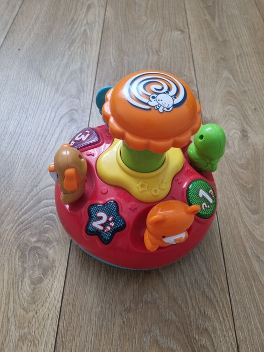 Interaktywny bączek VTech Wesołek Kręciołek.
