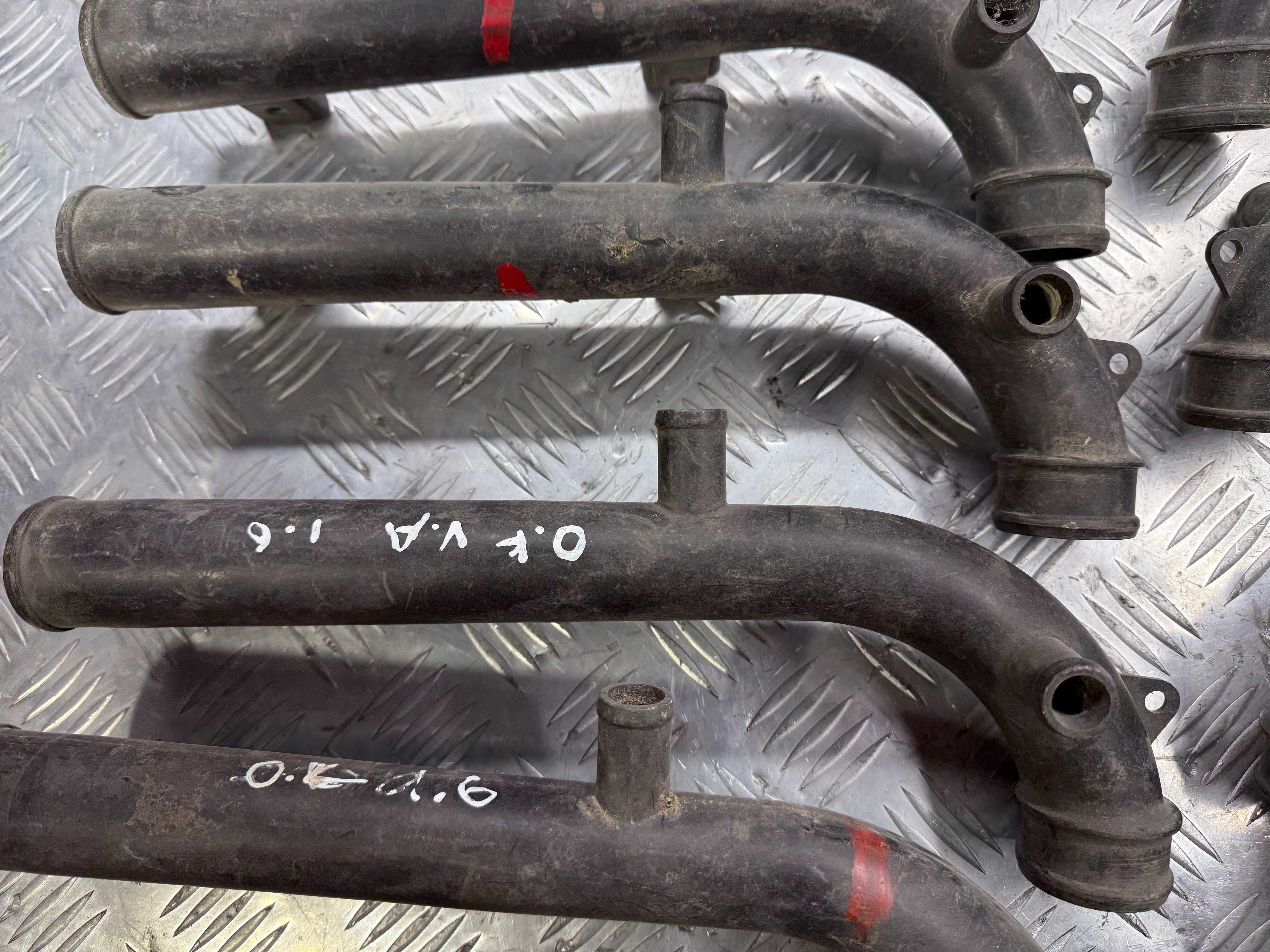 Патрубок системы охлаждения opel kadett 1.6, 1987-  90354635 90323360