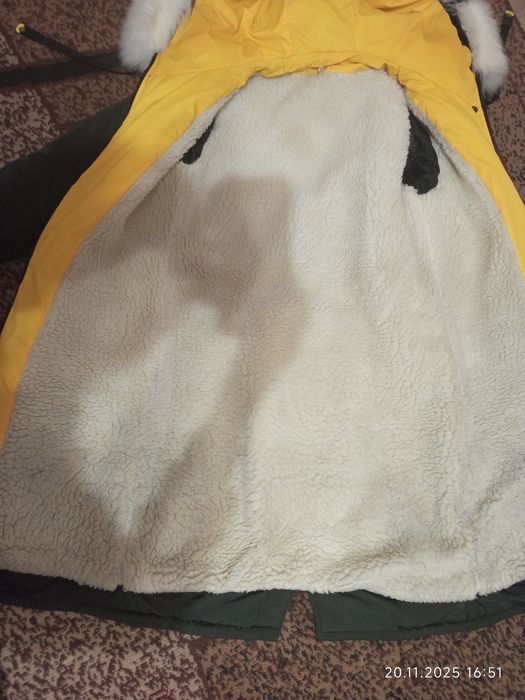 Теплюща зимова куртка