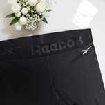 Czarne legginsy damskie Reebok kolarki sportowe rybaczki