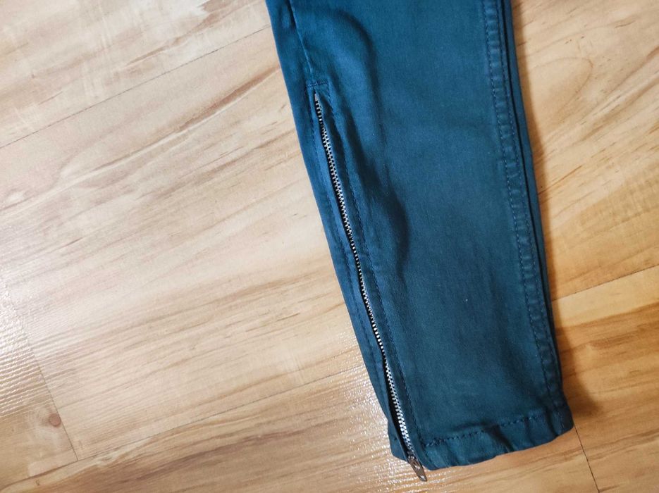 Zielone jeansy r.32