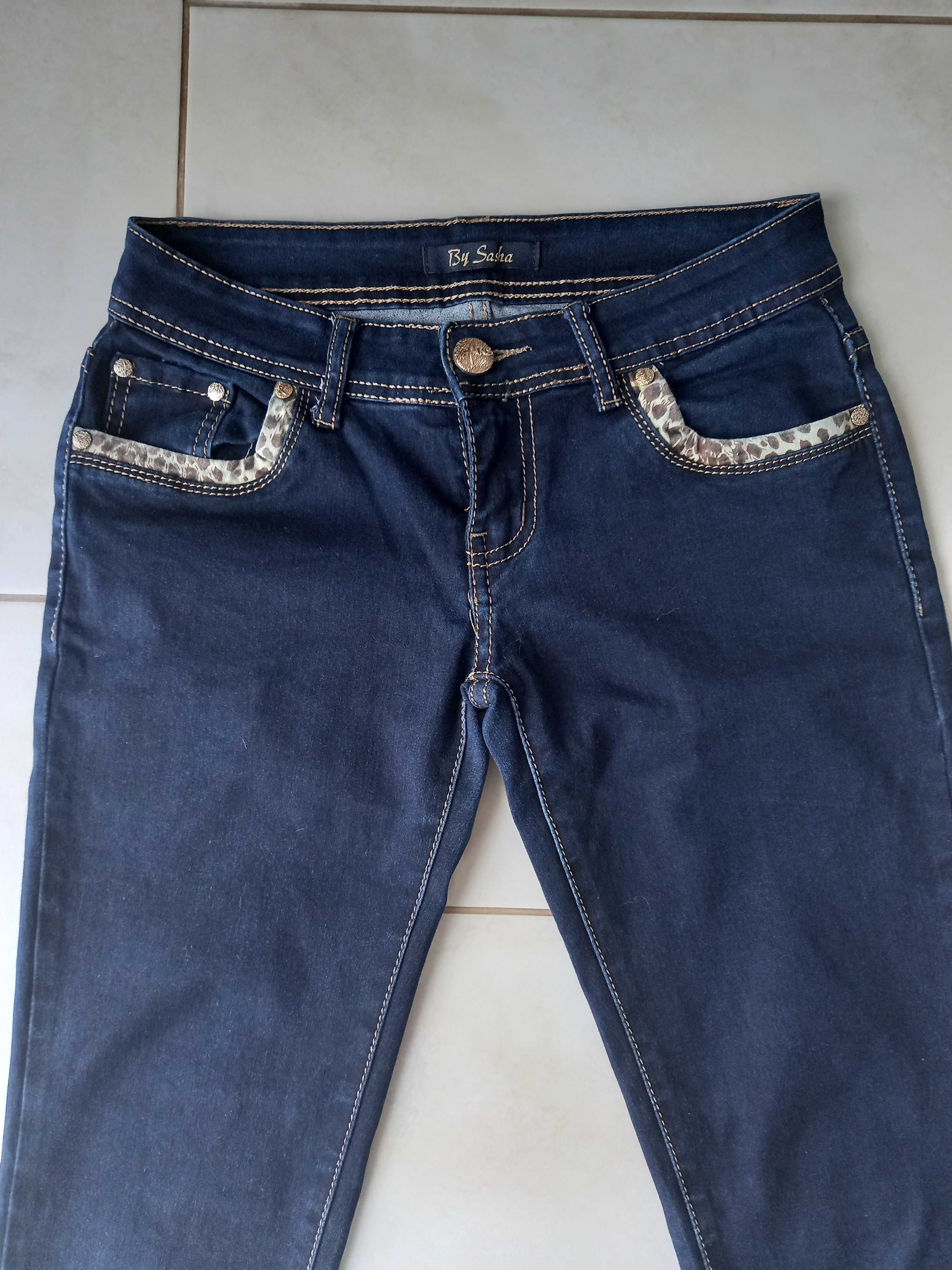 Spodnie jeansowe M 38 gumowane