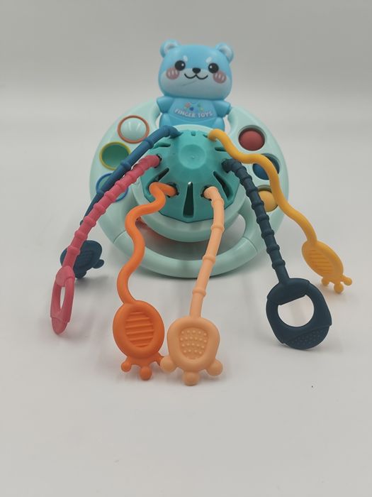 Interaktywna grzechotka sensoryczna niedźwiadek Finger Toys stan b.dob