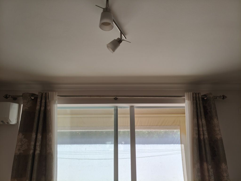 Varão de cortinados extensível