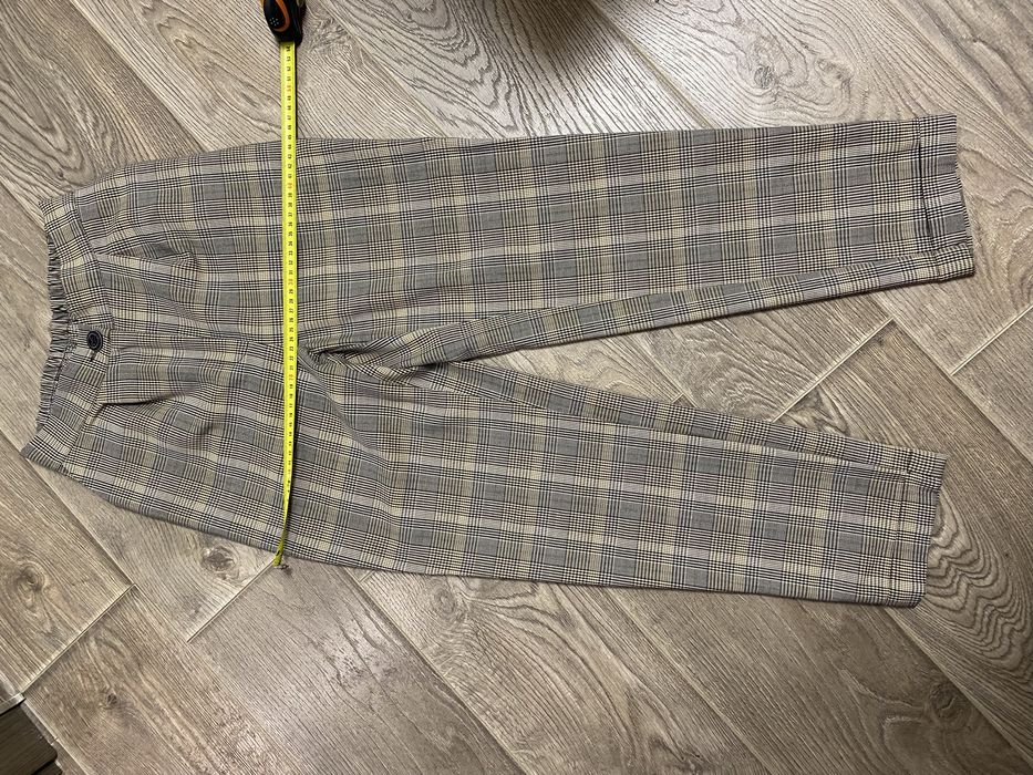 Костюм брючний в клітинку