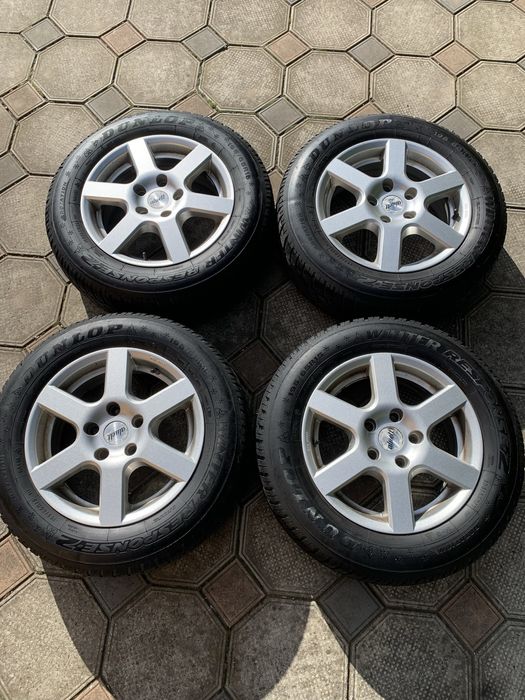 Колеса в зборі 195.65 r15 зима 5х112 Passat B5 B6 Golf Caddy Skoda A5