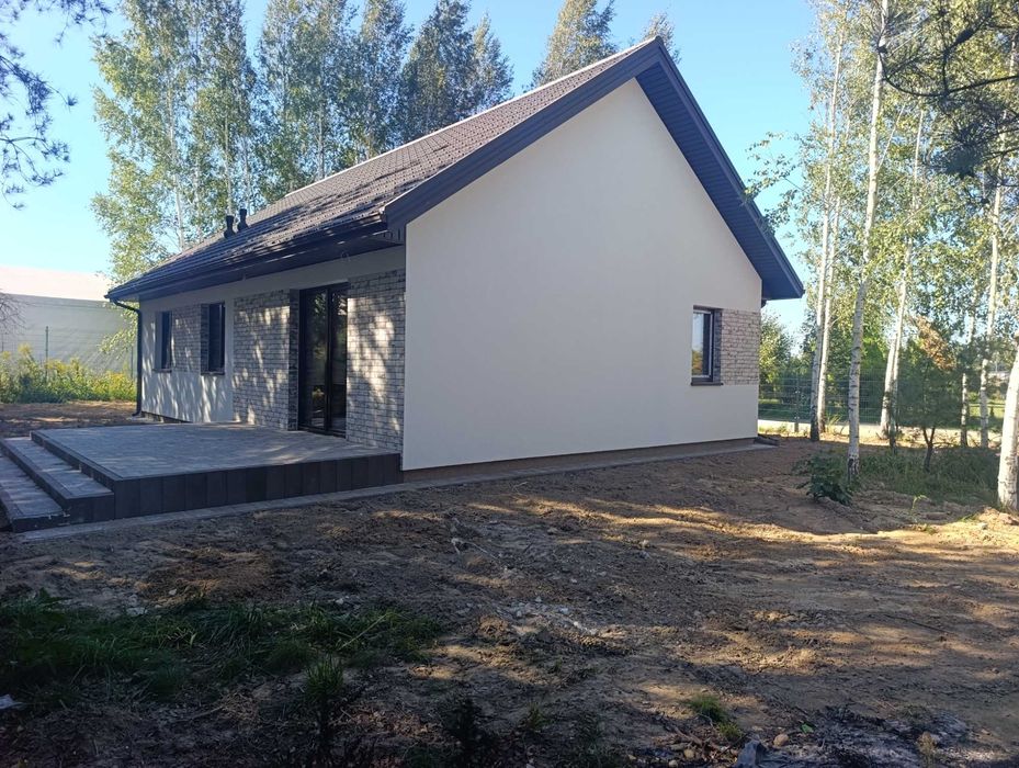 Nowy dom w stanie deweloperskim na dużej zagospodarowanej działce