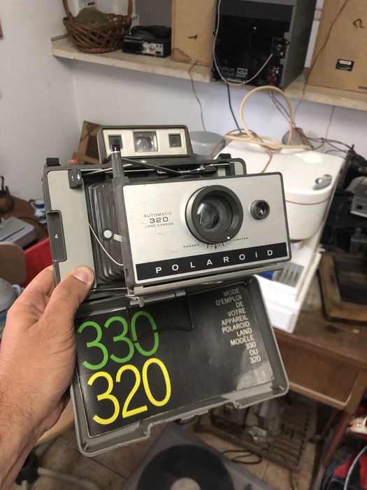 Máquina fotográfica Polaroid 320