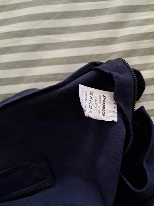 Calças pele pêssego azul quase novas