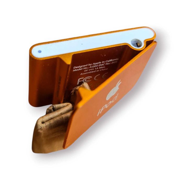 Apple iPod Shuffle 2ª Geração – Laranja (1 GB) com Base Dock Original