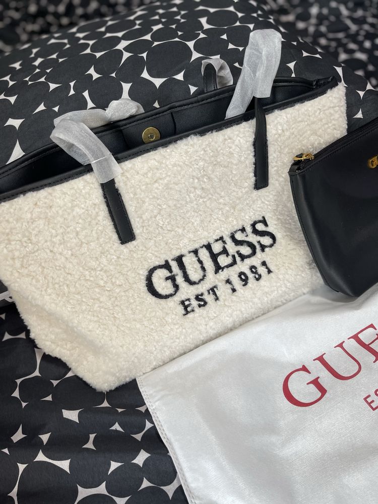Mala da guess nova ainda com o saco