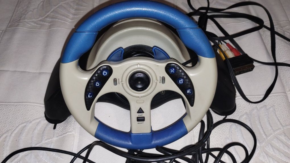 PlayStation PS2 preta com volante, pedais, câmara