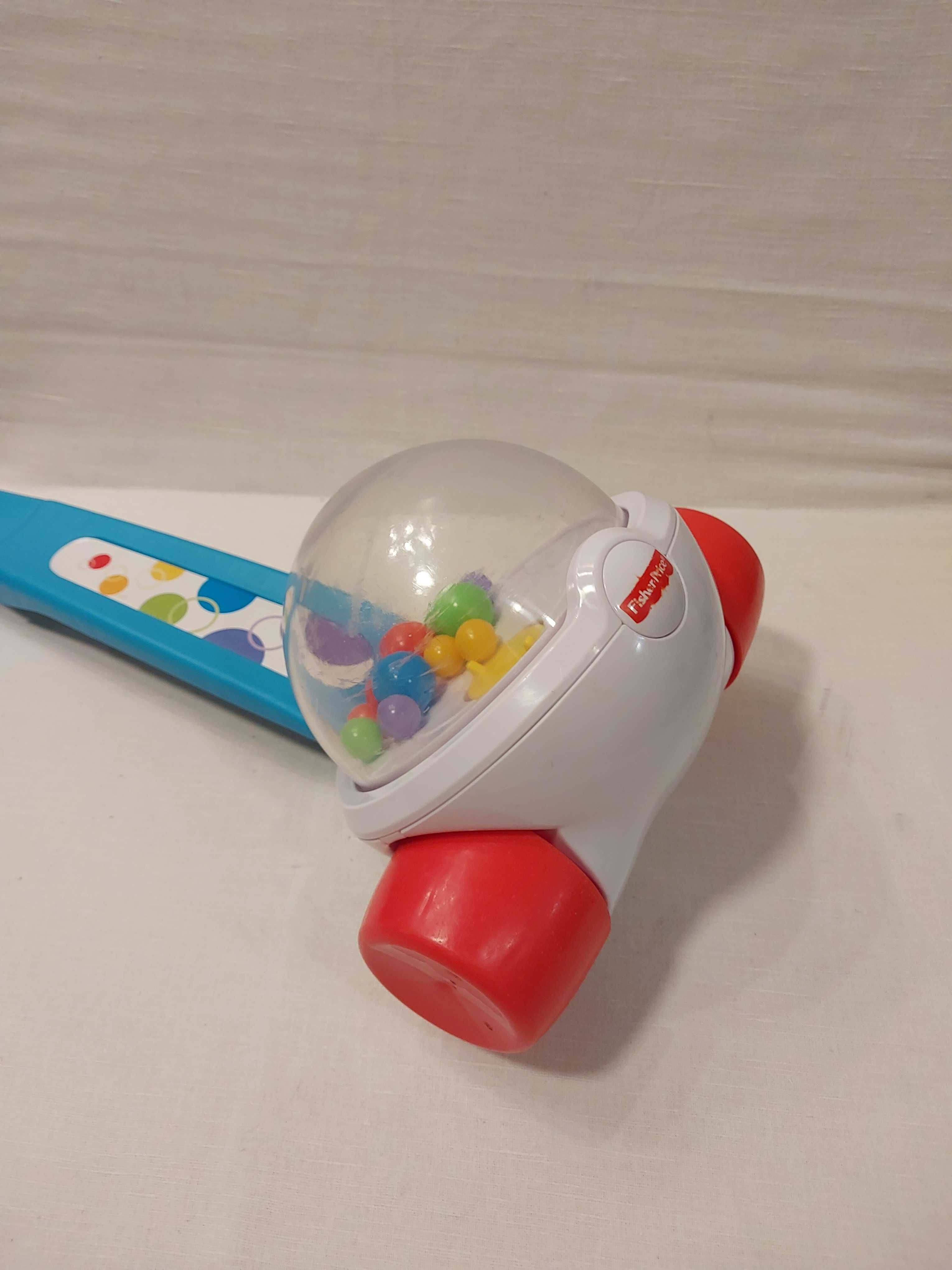 Fisher Price_Pchacz/ jeździk z podskakującymi kulkami