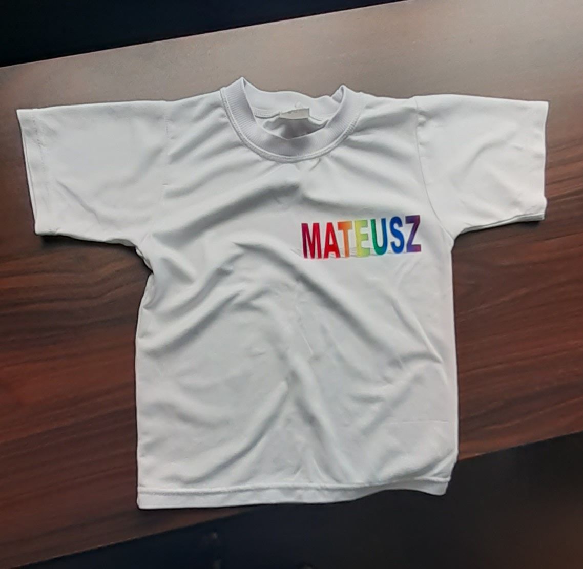 T-shirt r. 122 z workiem do stroju ; koszulka sportowa