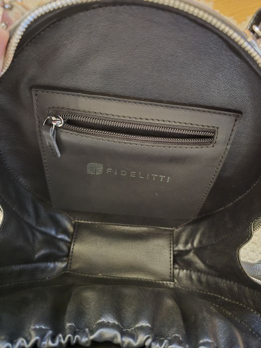 Fidelity оригінал кругла  medium