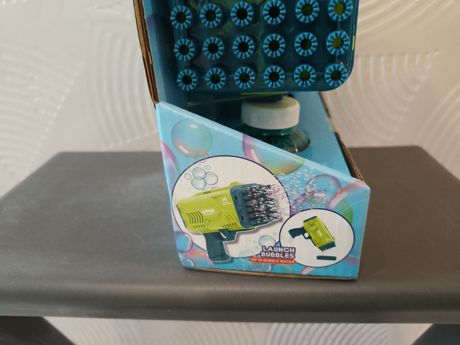 Kolorowa maszyna do baniek mydlanych automatyczna maszyna Zielona