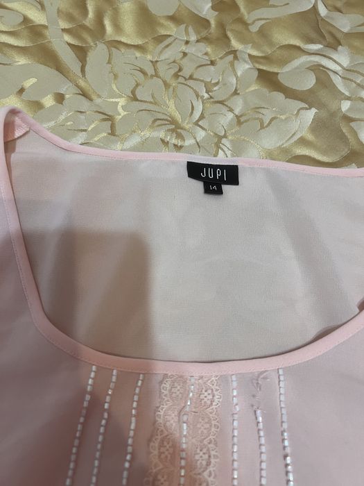 Подарую блузку Xl