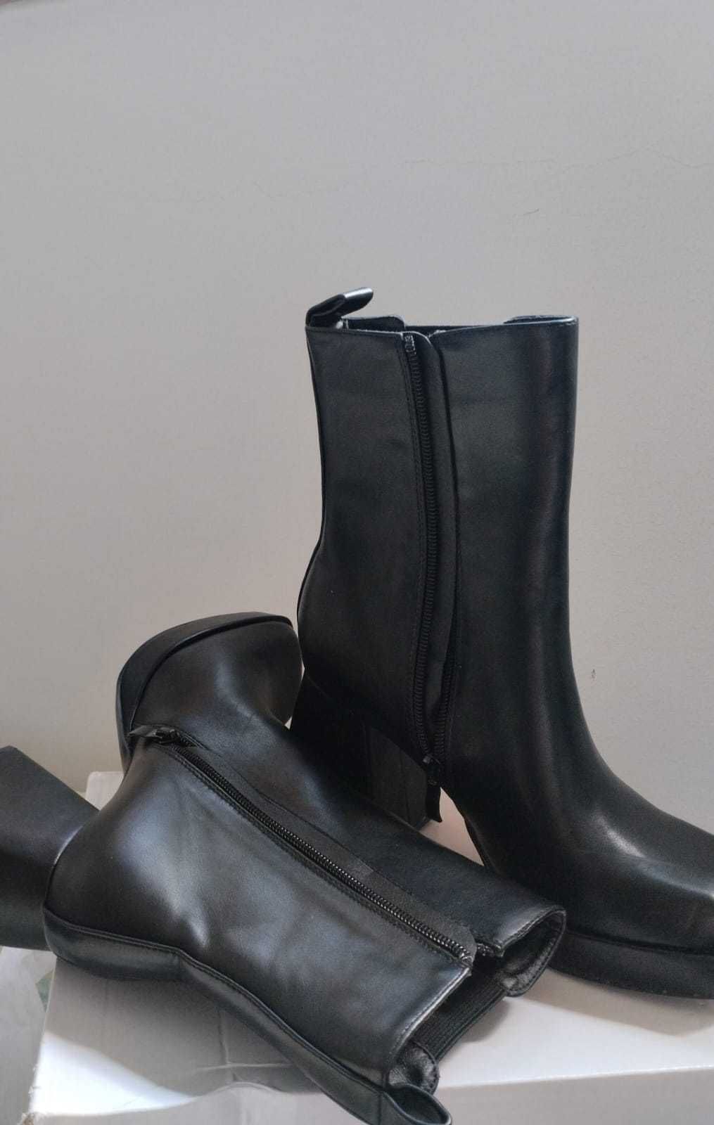 Botas de cano médio da "Mellisa".