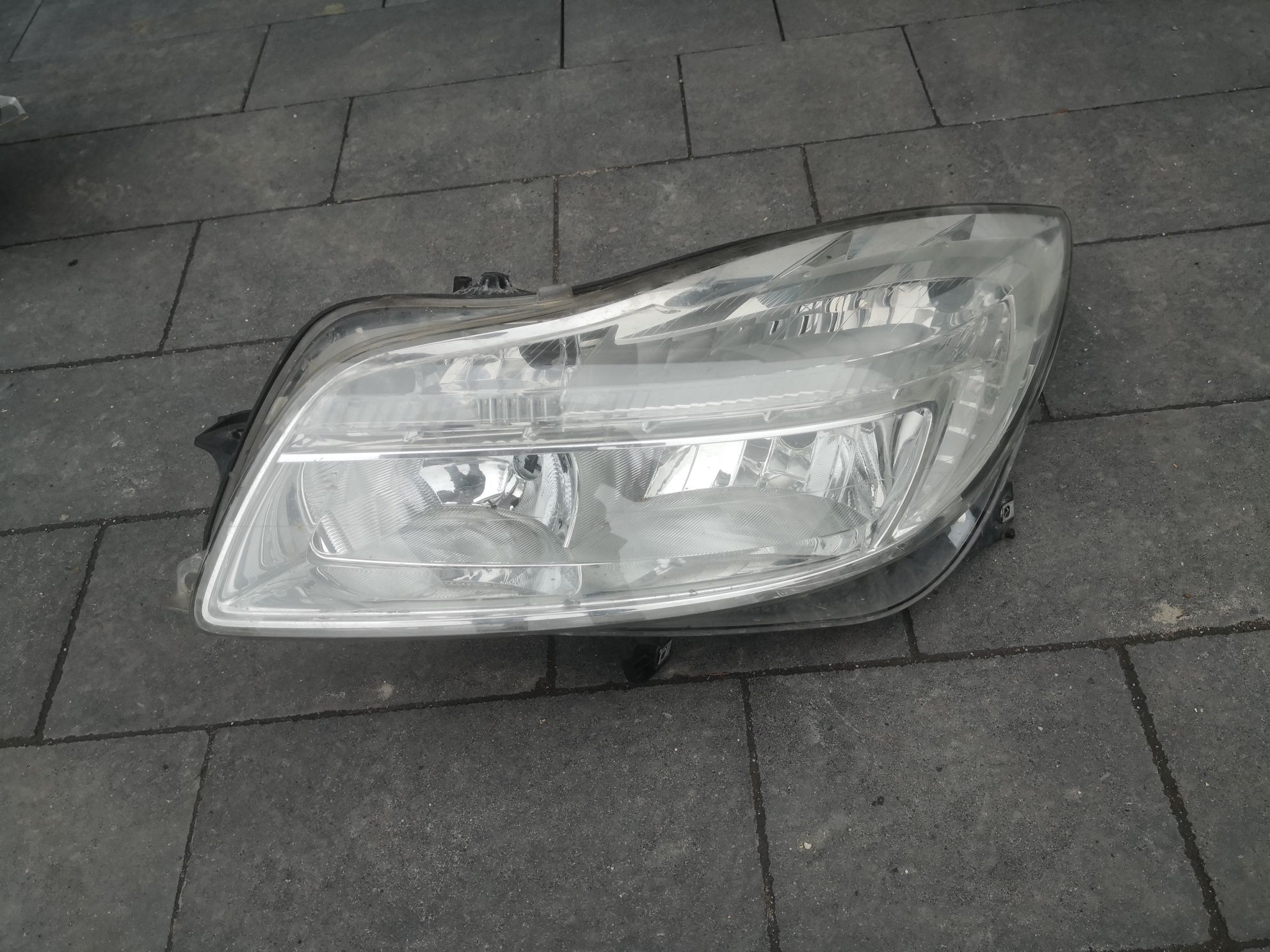 Reflektor lewy Opel Insignia lampa lewa Europa