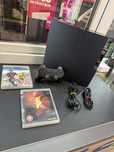 Konsola Sony PS3 Slim + pad + okablowanie + gry