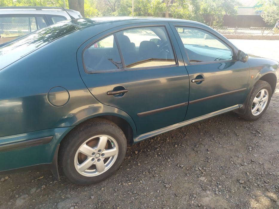 Шкода 1.6 газ/бензин