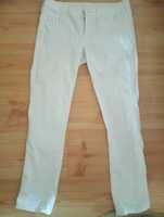 Białe rozciągliwe lekkie spodnie damskie Denim r M/L