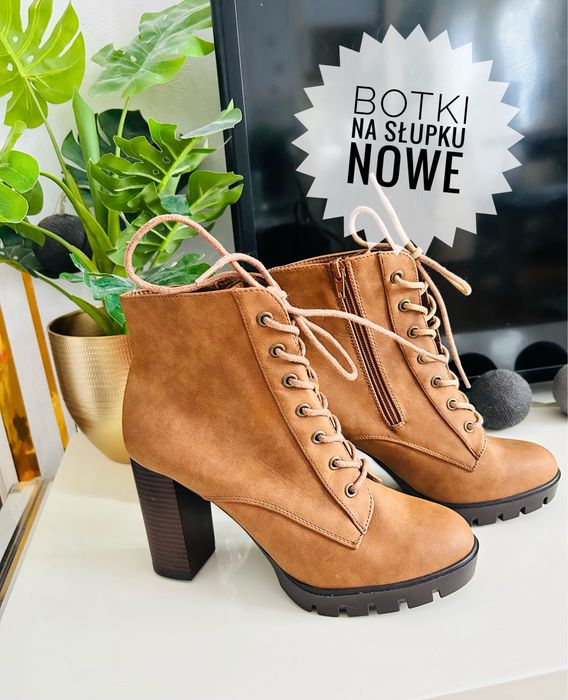 Nowe brązowe botki na wysokim słupku 40