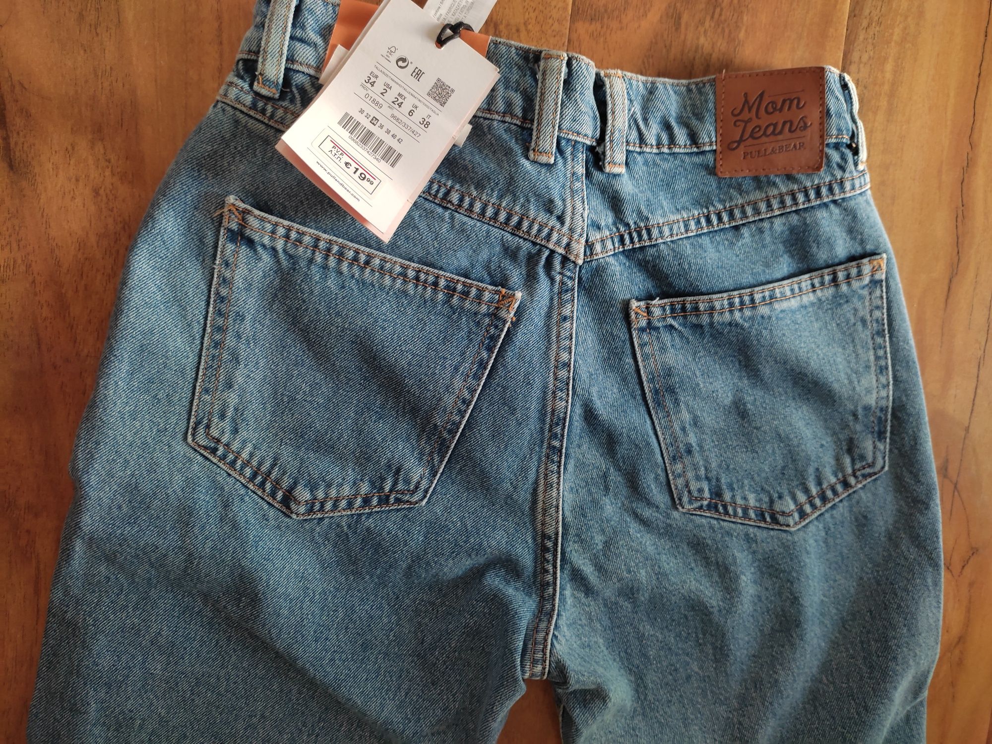 Damskie spodnie mom jeans rozmiar 34