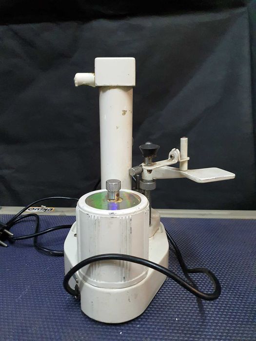 Máquina vintge de perfuração e entalhe de lentes
