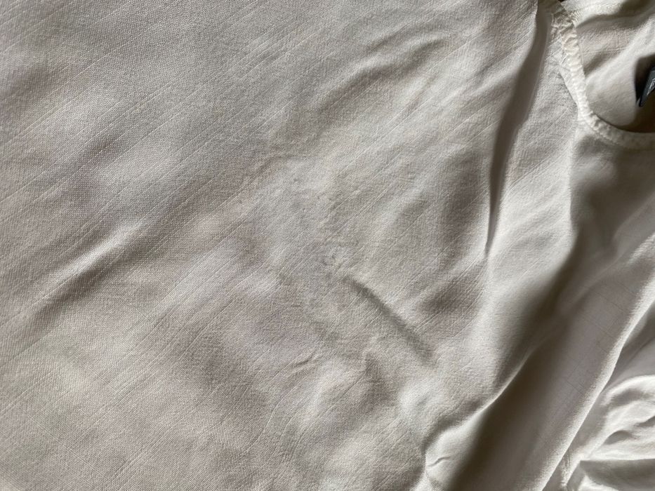 Biala elegancka bluzka z baskinką