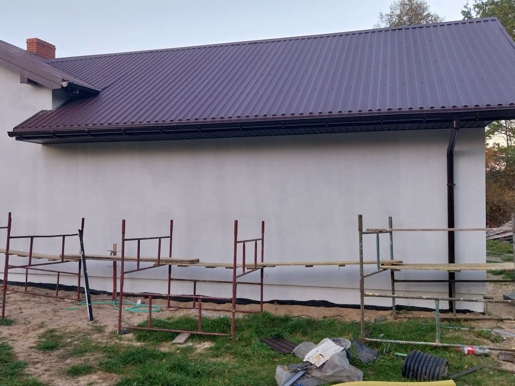Ocieplenia, malowanie elewacji, klejenie  papy  termozgrzewalnej  Woln