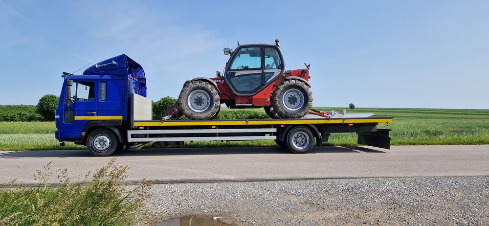 Transport Laweta przewóz maszyn, pojazdów