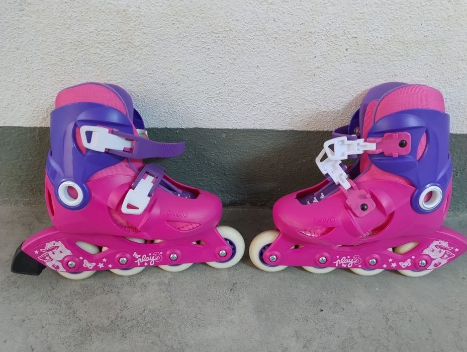 Patins rosa e roxo. Tamanho 28